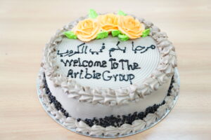 A cake to welcome new Arabic Support Group members