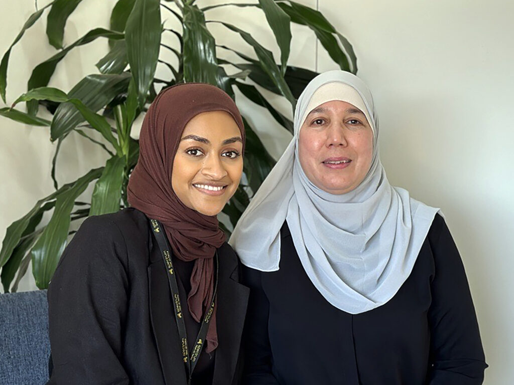 Two women wearing hijabs